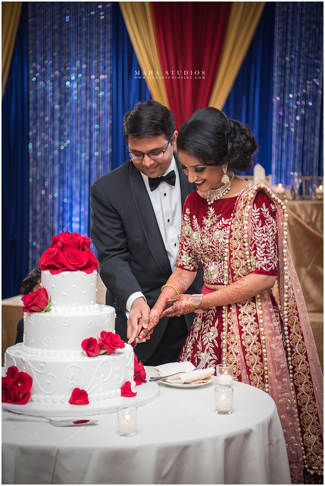Telegu Bride and Groom cut simple white Chicago Wedding Cake at their reception in Marriott O'Hare