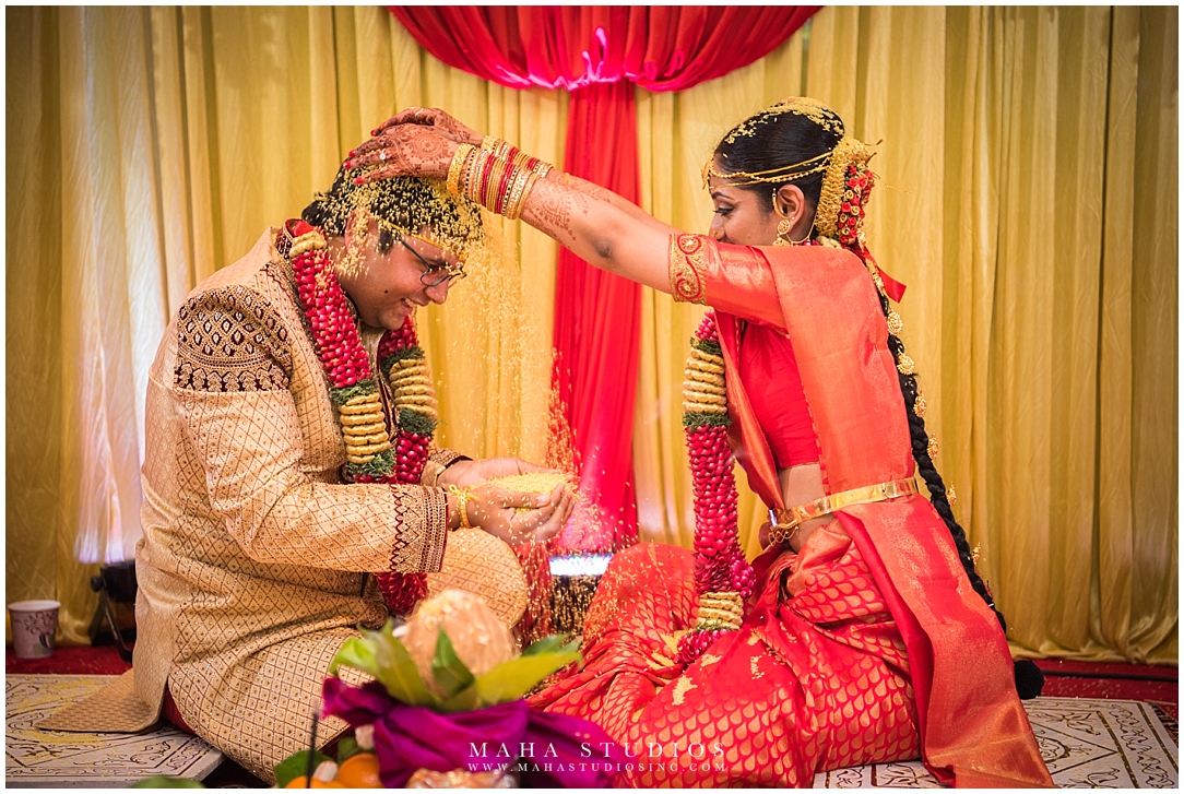 South Indian Bride and Groom rice shower