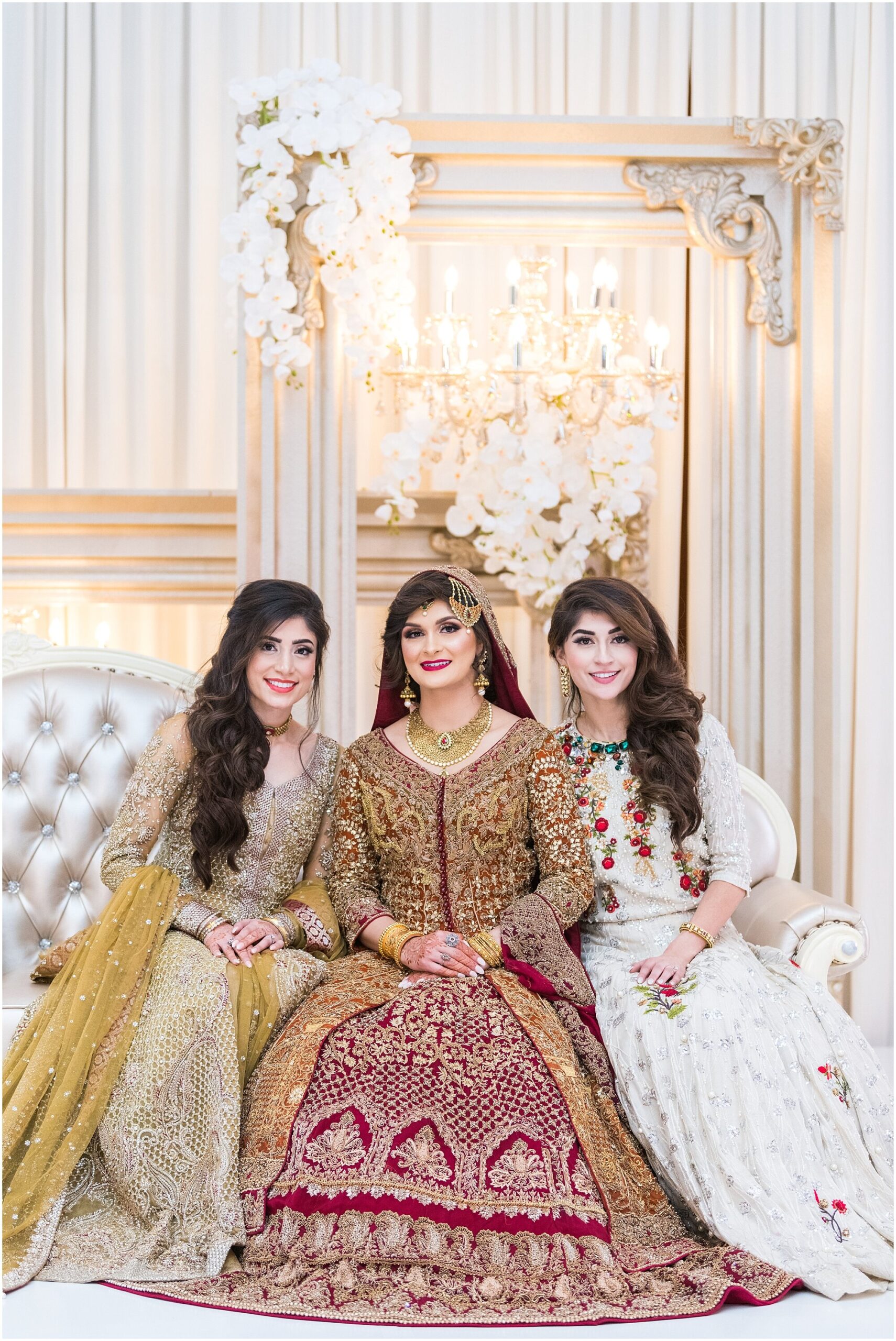 Louisville Pakistani bride posing with her friends at her wedding reception.
