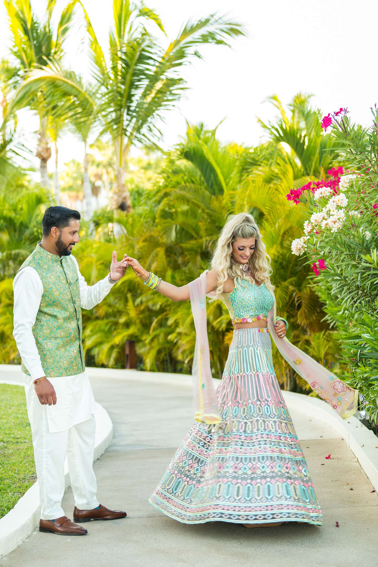Punjabi bride and groom at Cabo wedding before their jaggo night party at Paradisus resort.