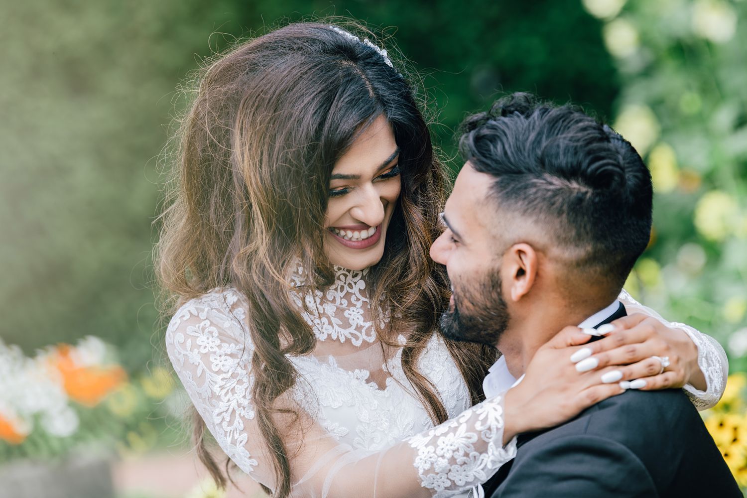Closeup of wedding couple laughing at Chicago Botanic Garden