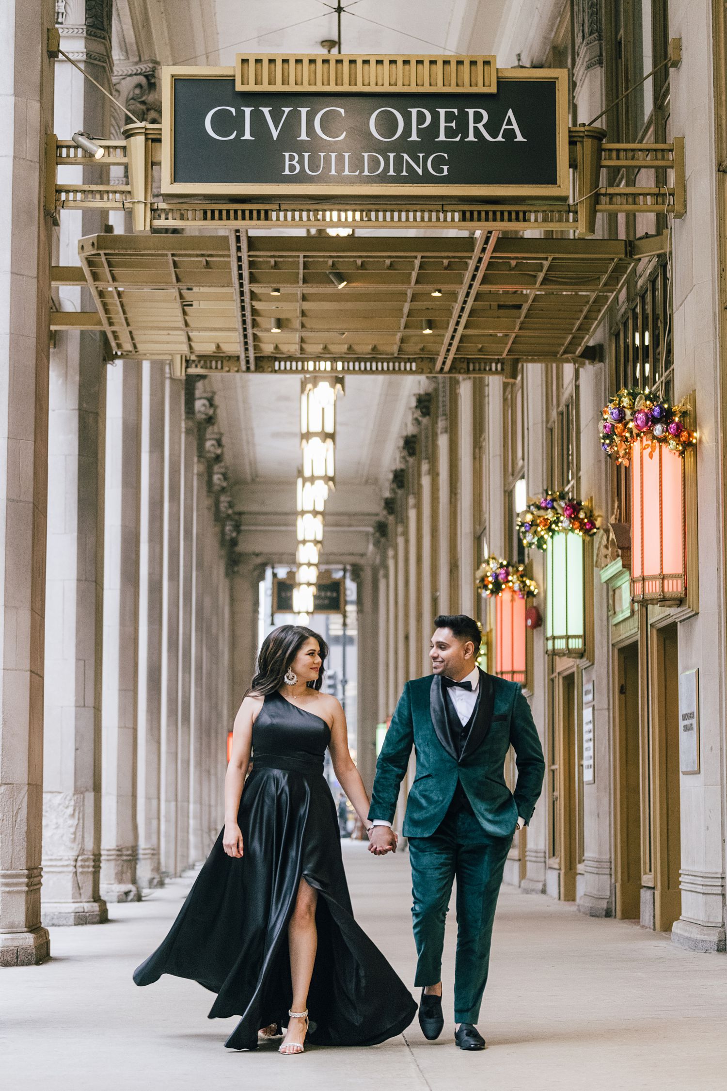 Chic downtown chicago engagement photos at Lyric Opera House. Photographed by wedding photographer Maha Studios