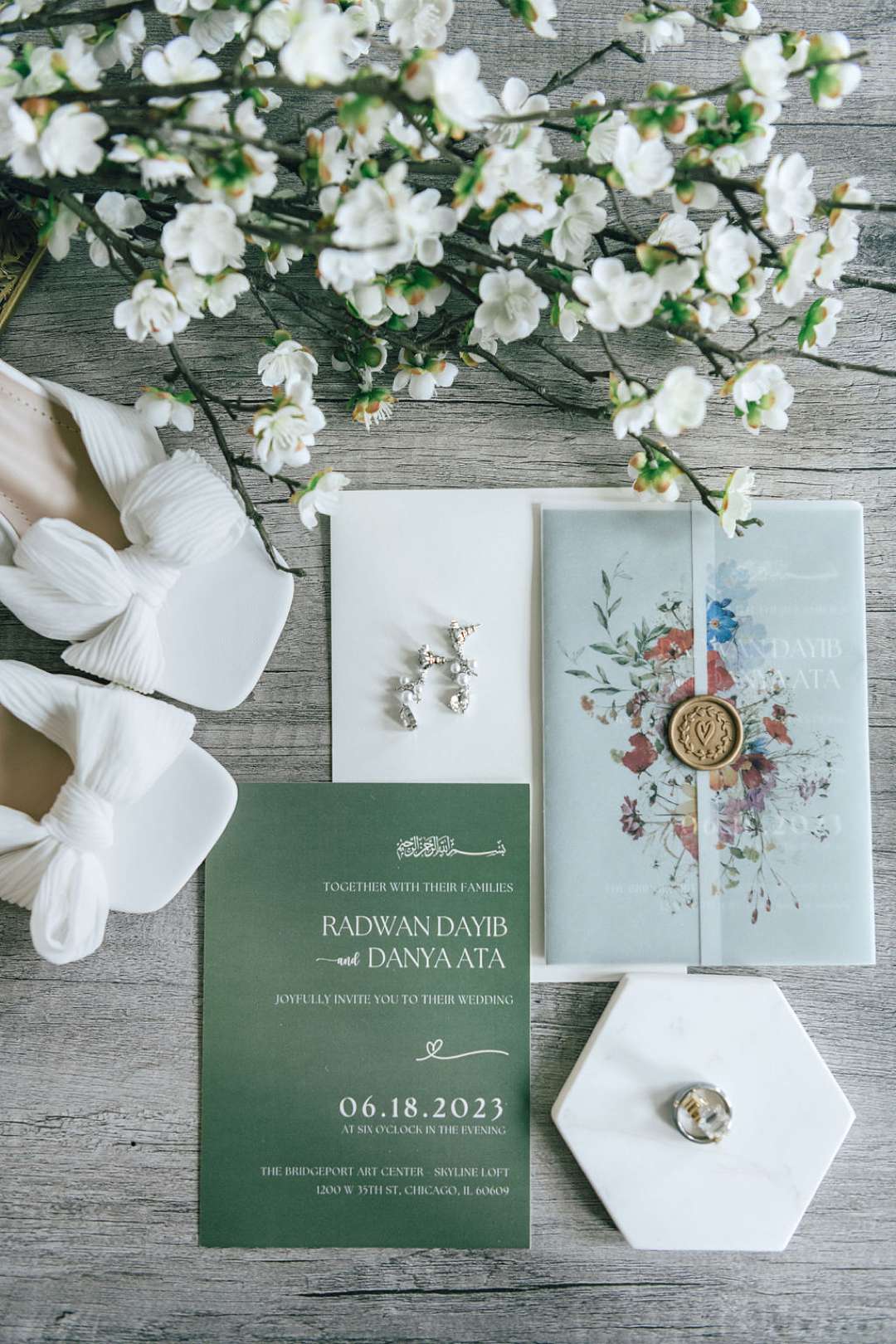 Flat Lay of Wedding Invitation Suite and Bridal Details