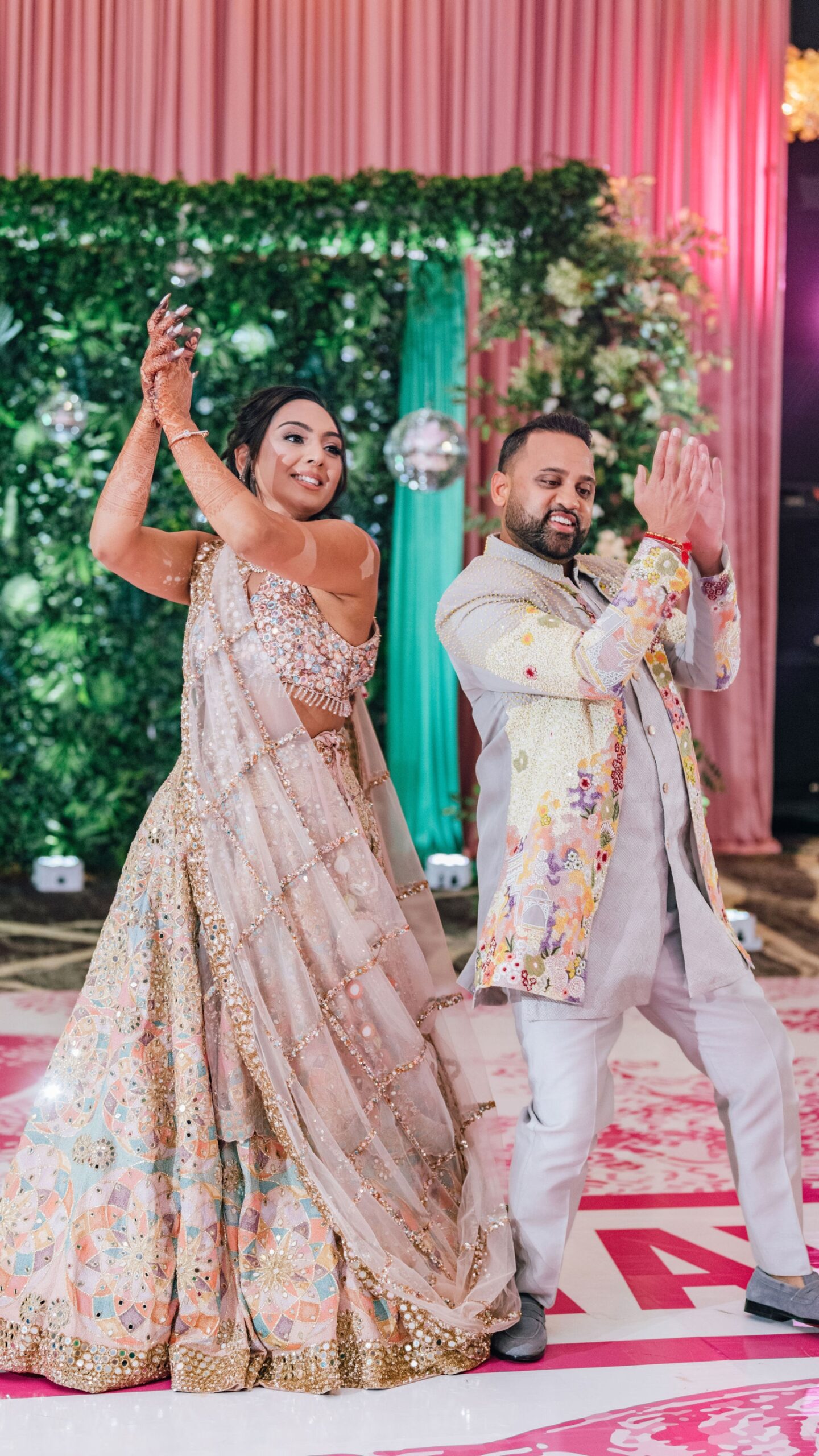 Indian Bride and Groom dancing at Sangeet